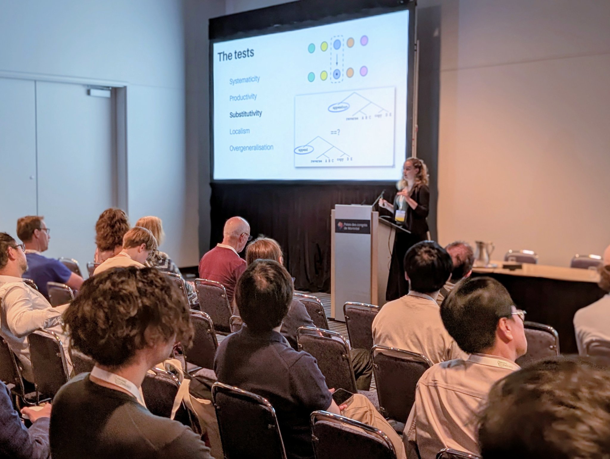 Verna Dankers presenting at IJCAI